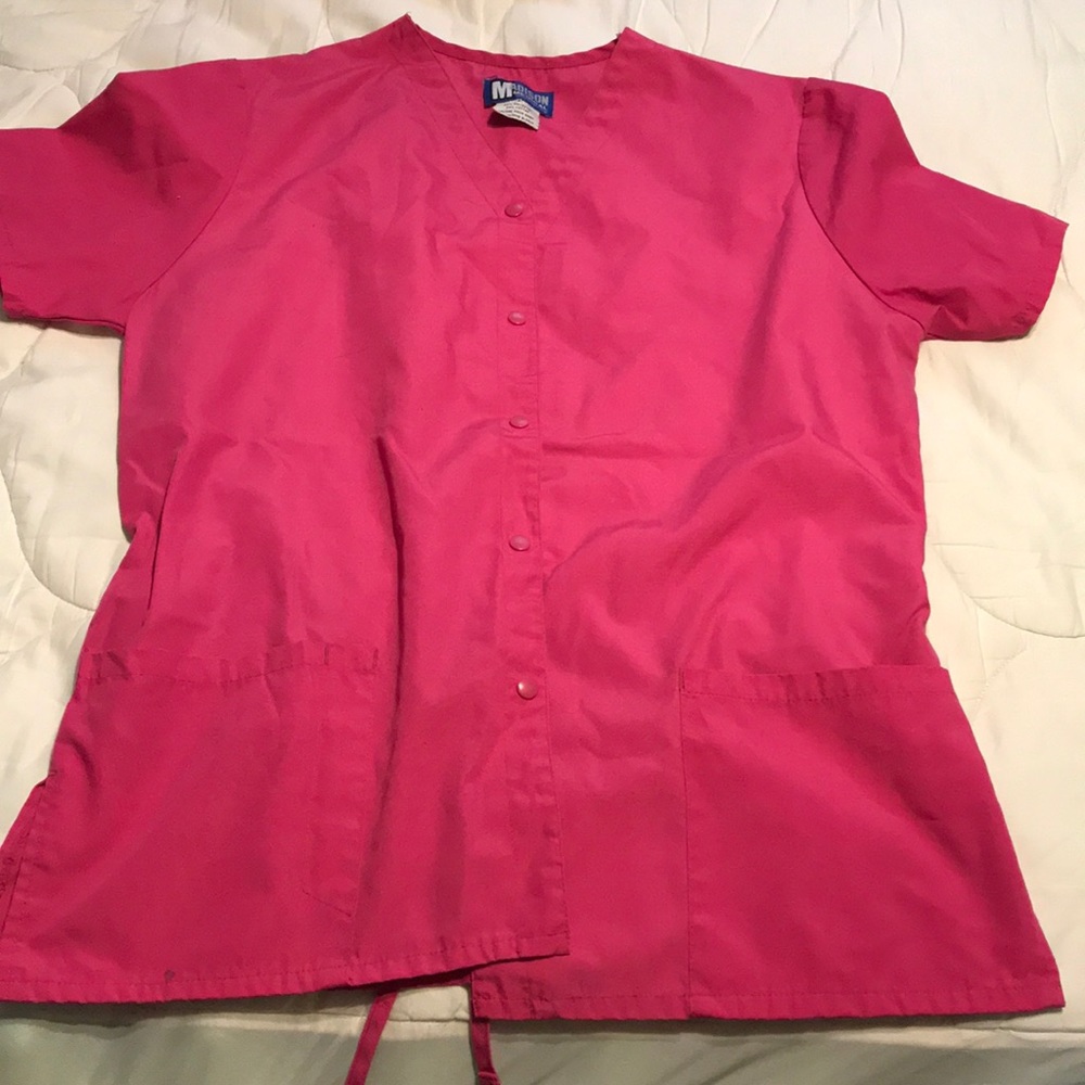 Pink scrub top.